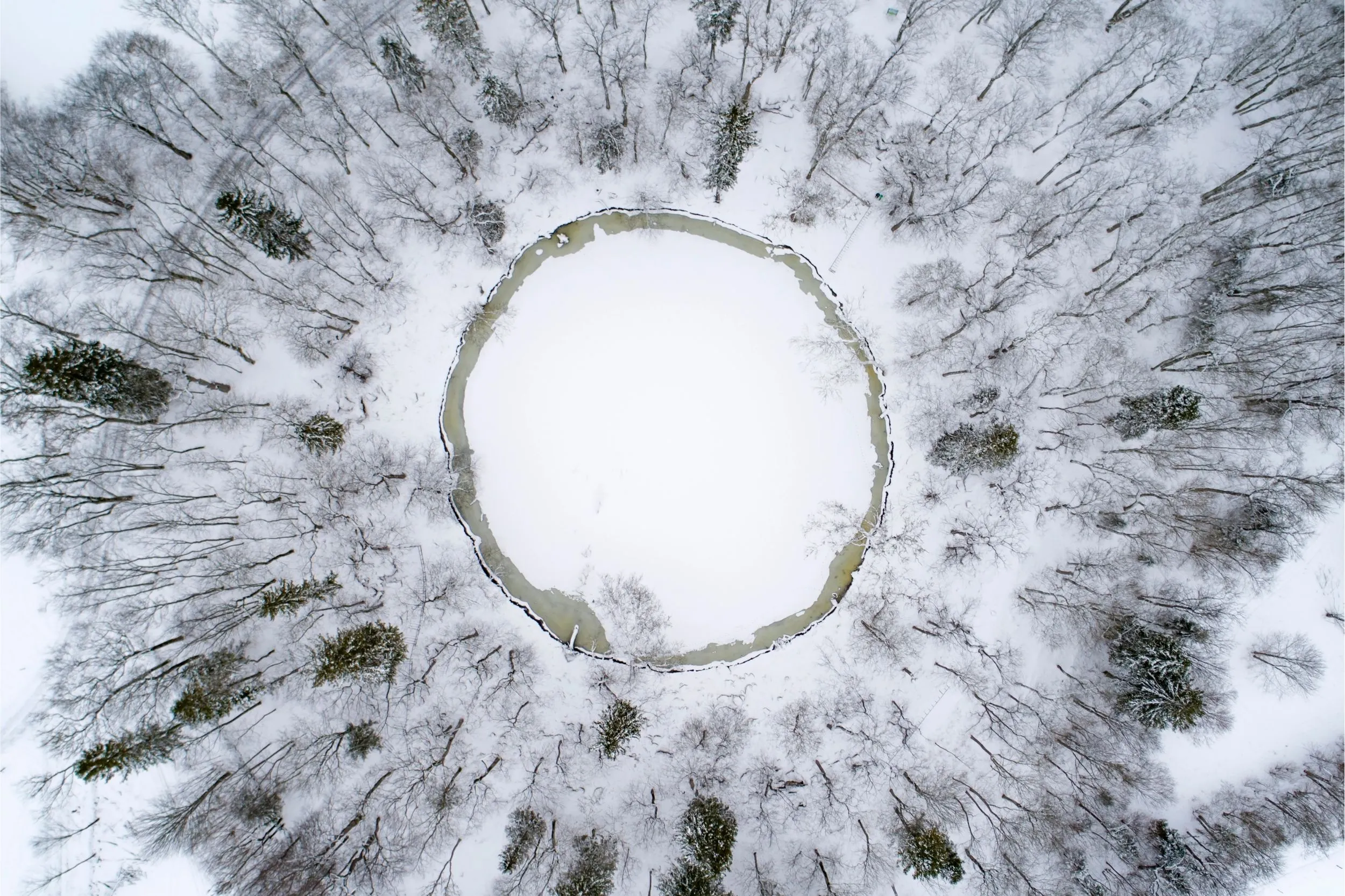 Aerial winter view of Kaali Crater in Saaremaa, Estonia, photographed by Marko Palm for Visit Saaremaa